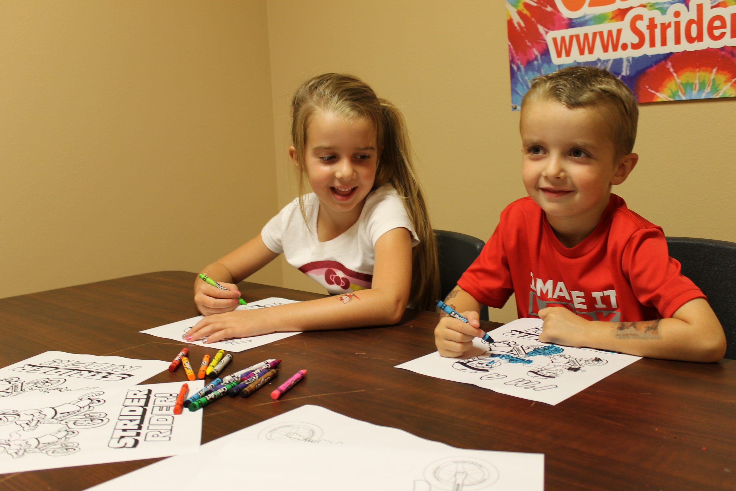 Kids coloring on coloring sheets