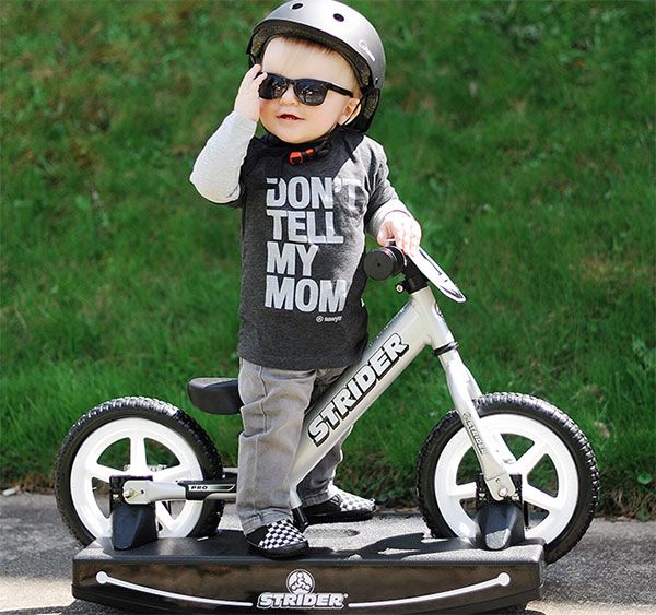 Young toddler on Strider Pro 2-in-1 Rocking Bike